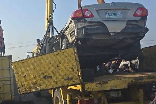 Driver Miraculously Rescued Alive As 40ft Container Falls On Toyota Camry At Mile 2 - autojosh 