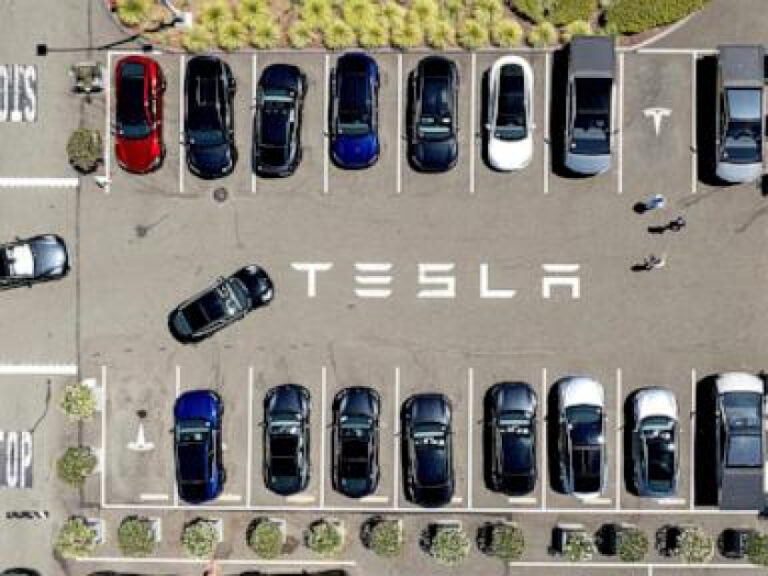 Parents of 2 students killed in Tesla allege design flaw trapped them in burning car
