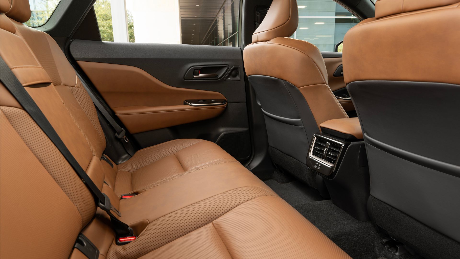 Close-up shot of the tan leather seats in the rear of the 2025 Toyota Crown Signia Limited.