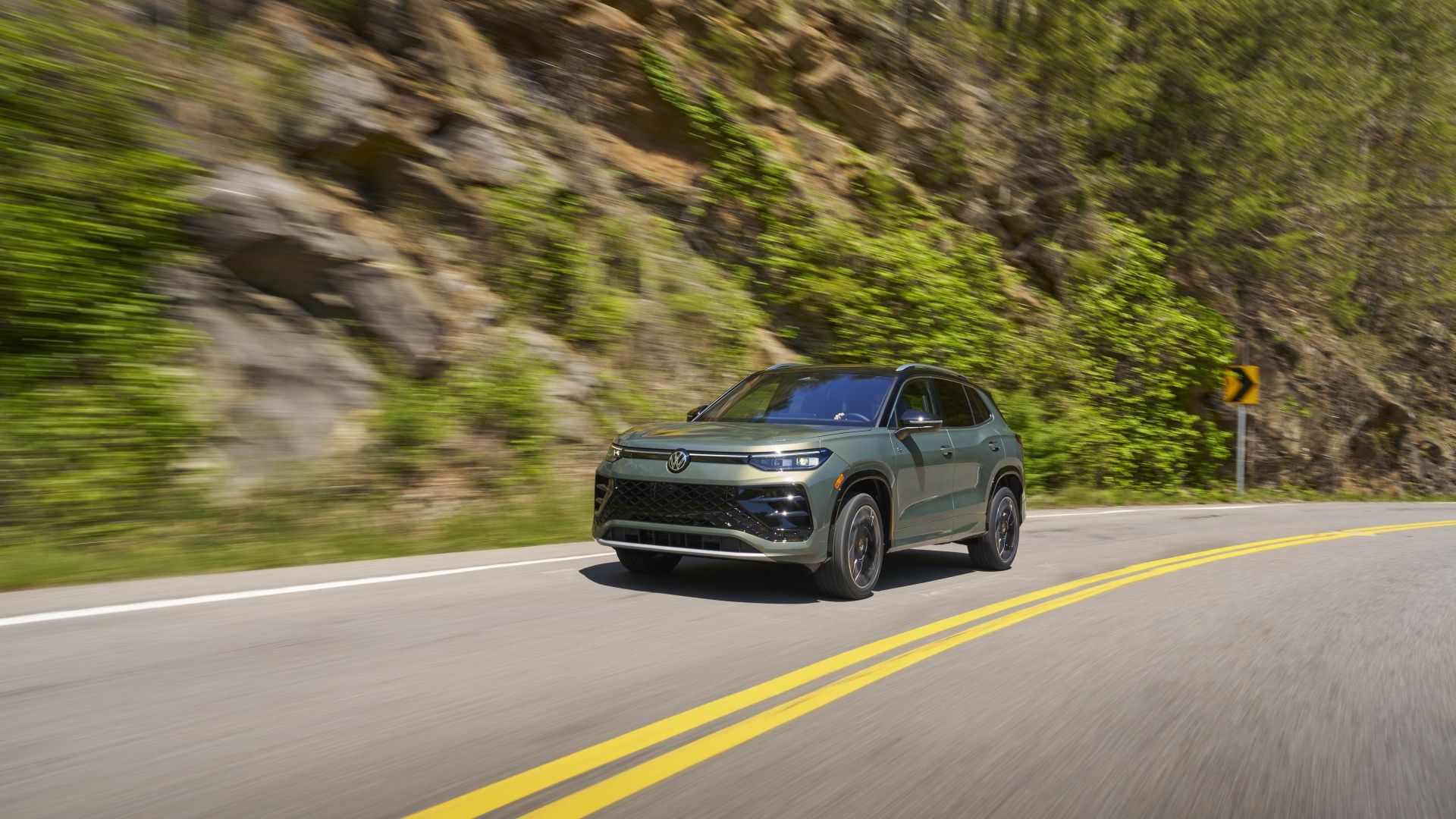 Front 3/4 action shot of a 2026 Volkswagen Tiguan 