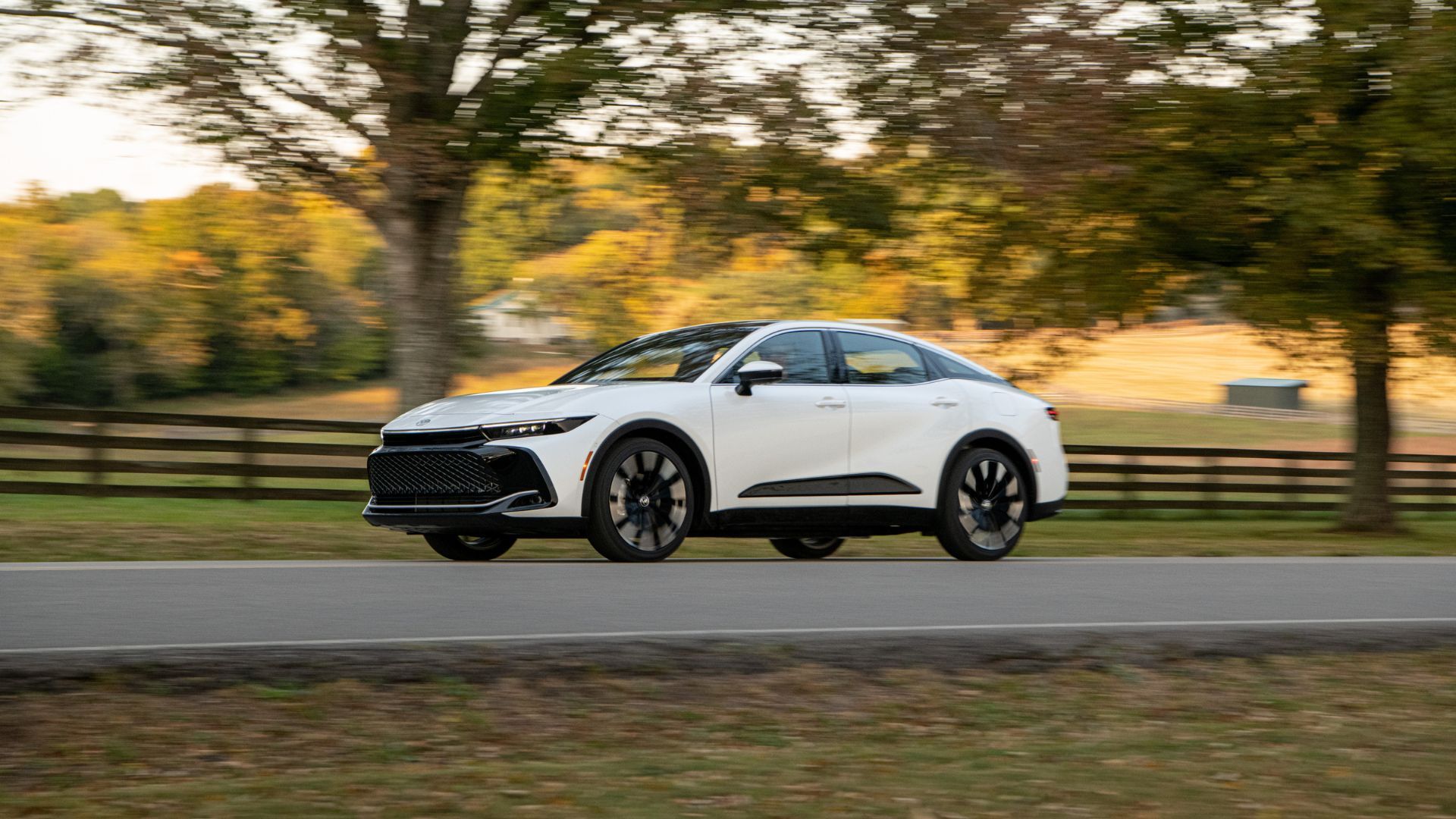 Dynamic front 3/4 shot of a white 2026 Toyota Crown Platinum.