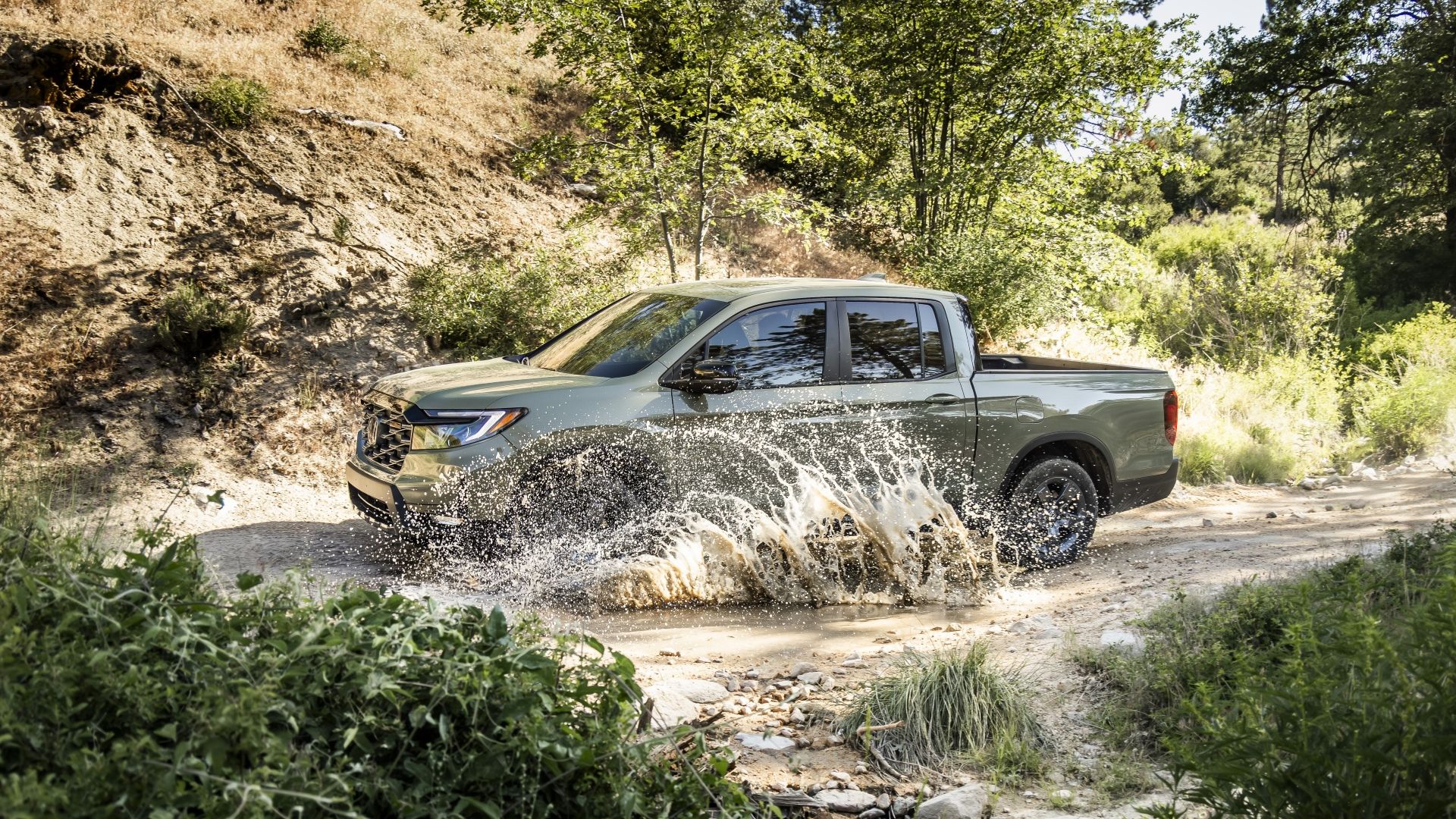 Side action shot of a 2026 Honda Ridgeline TrailSport