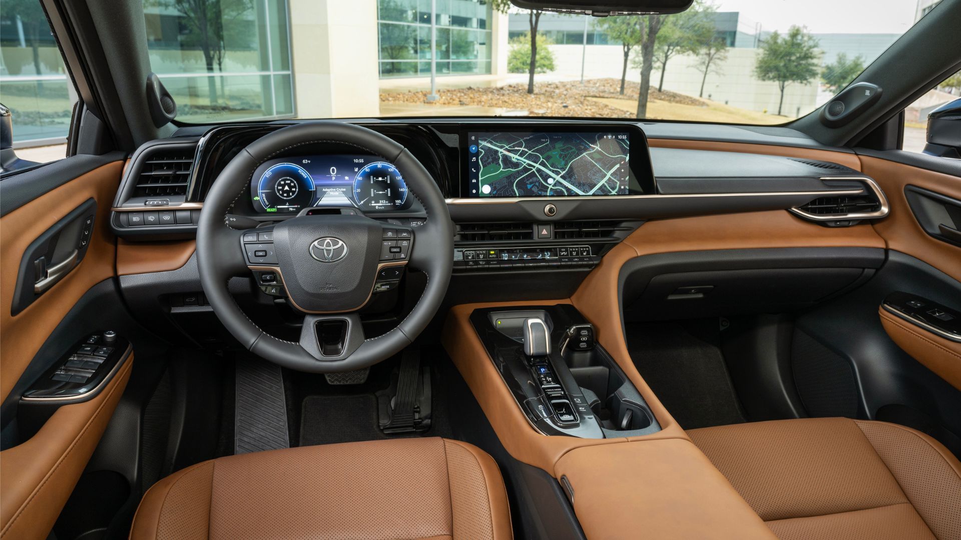 Close-up shot of the dashboard in the 2025 Toyota Crown Signia Limited, showing the steering wheel and infotainment screen.
