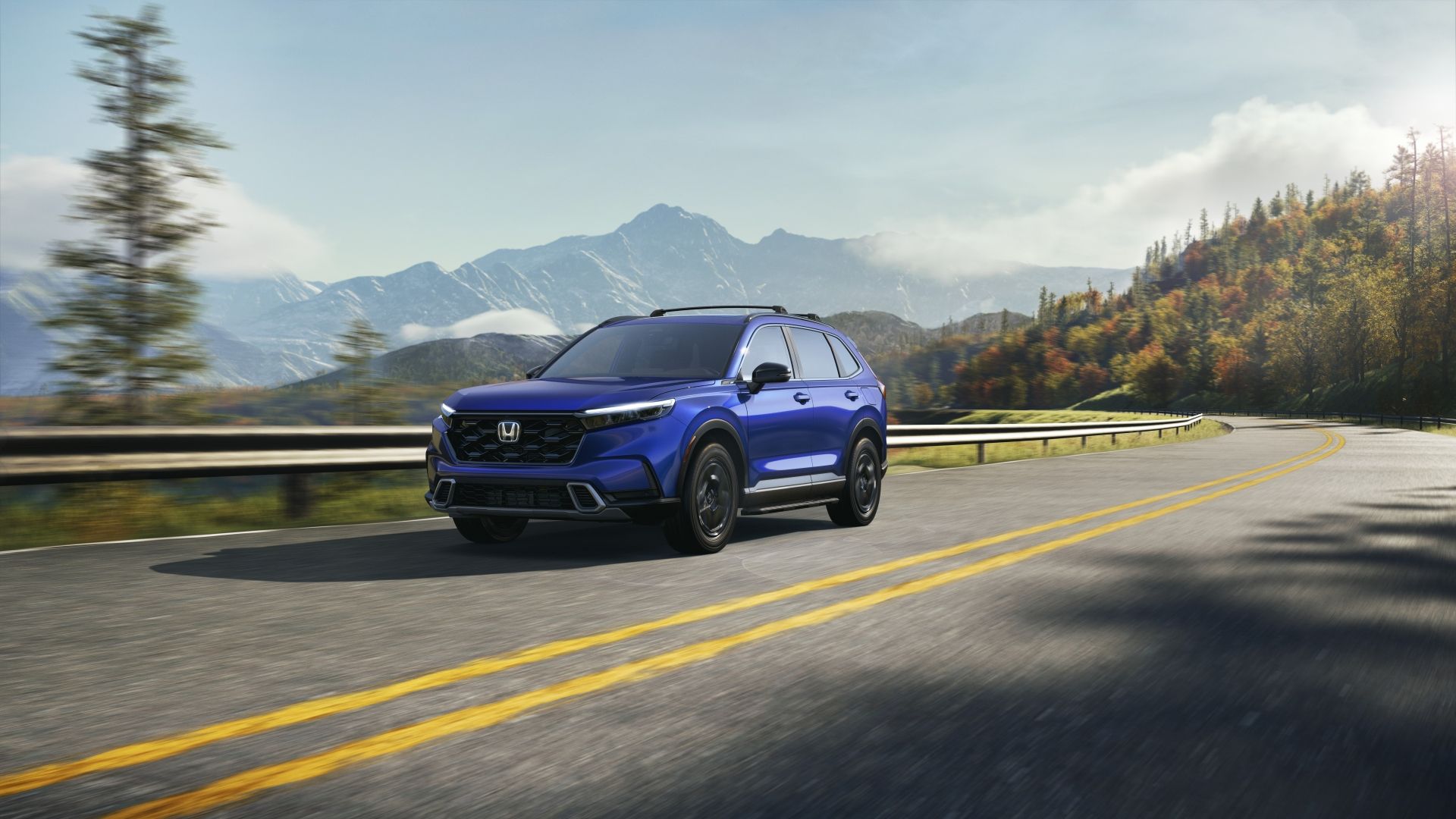 Front 3/4 action shot of a 2023 Honda CR-V Sport Touring