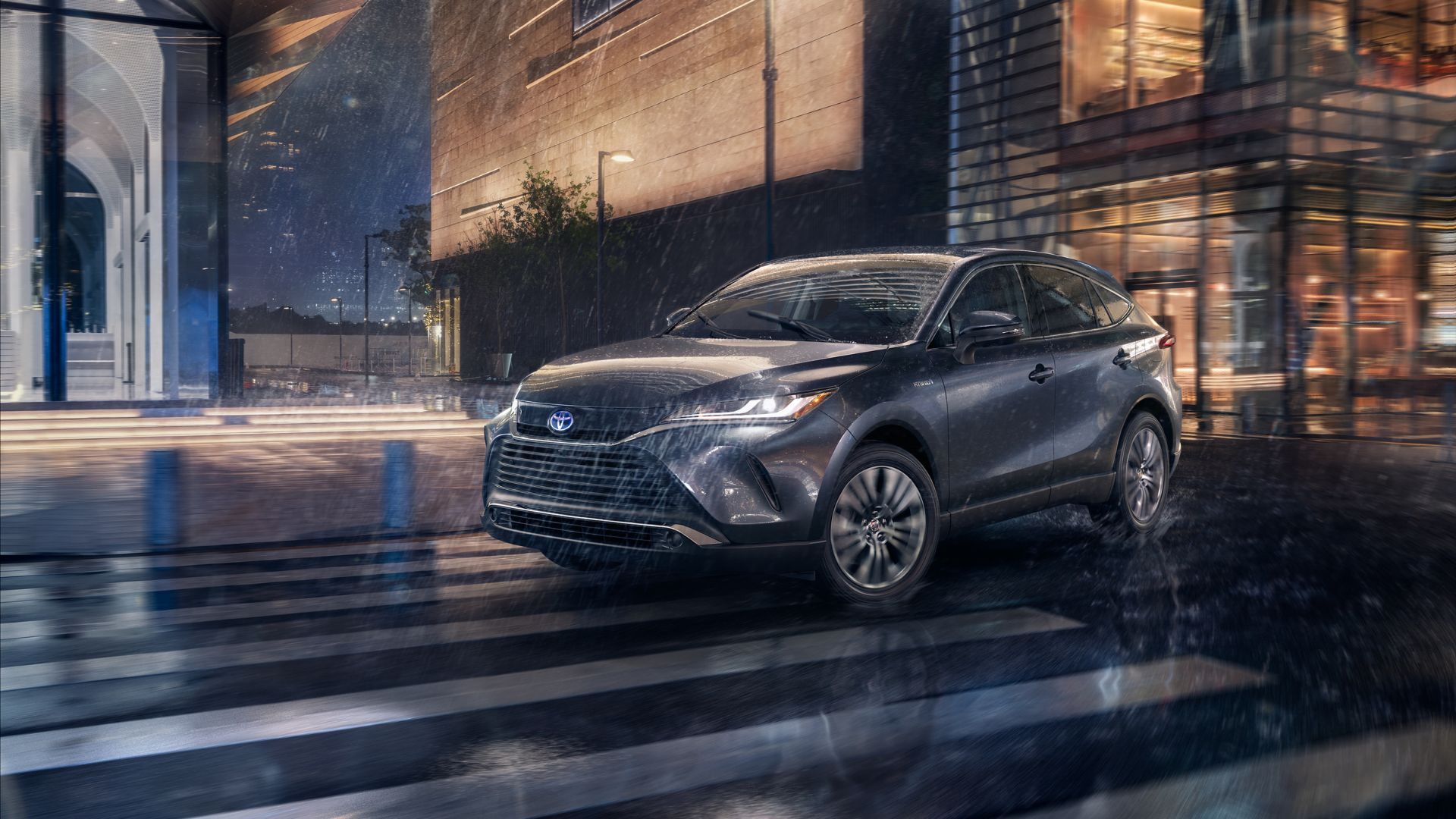 Dynamic front 3/4 shot of a gray 2024 Toyota Venza Limited.