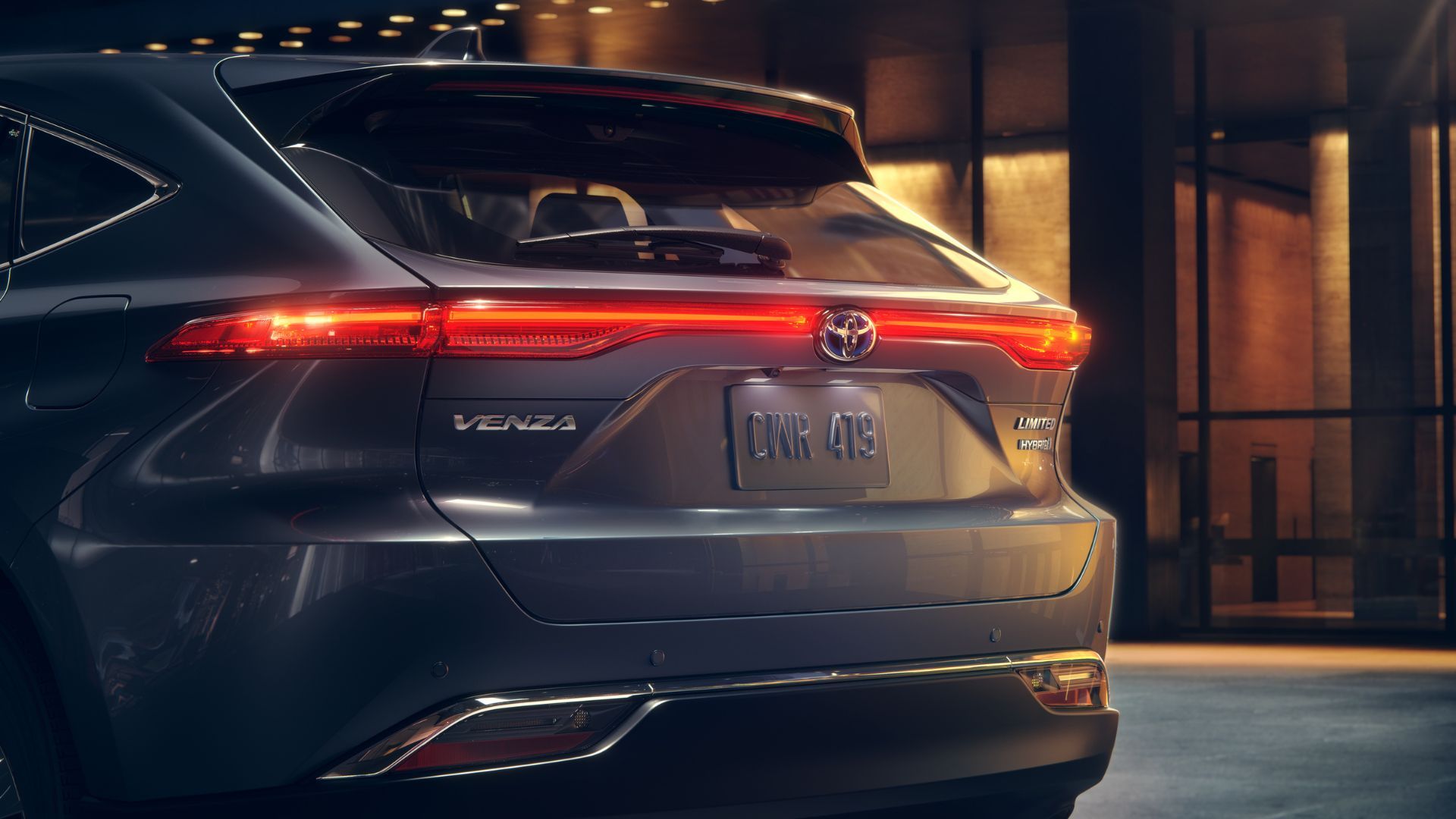Close-up shot of the rear end of a gray 2024 Toyota Venza Limited.