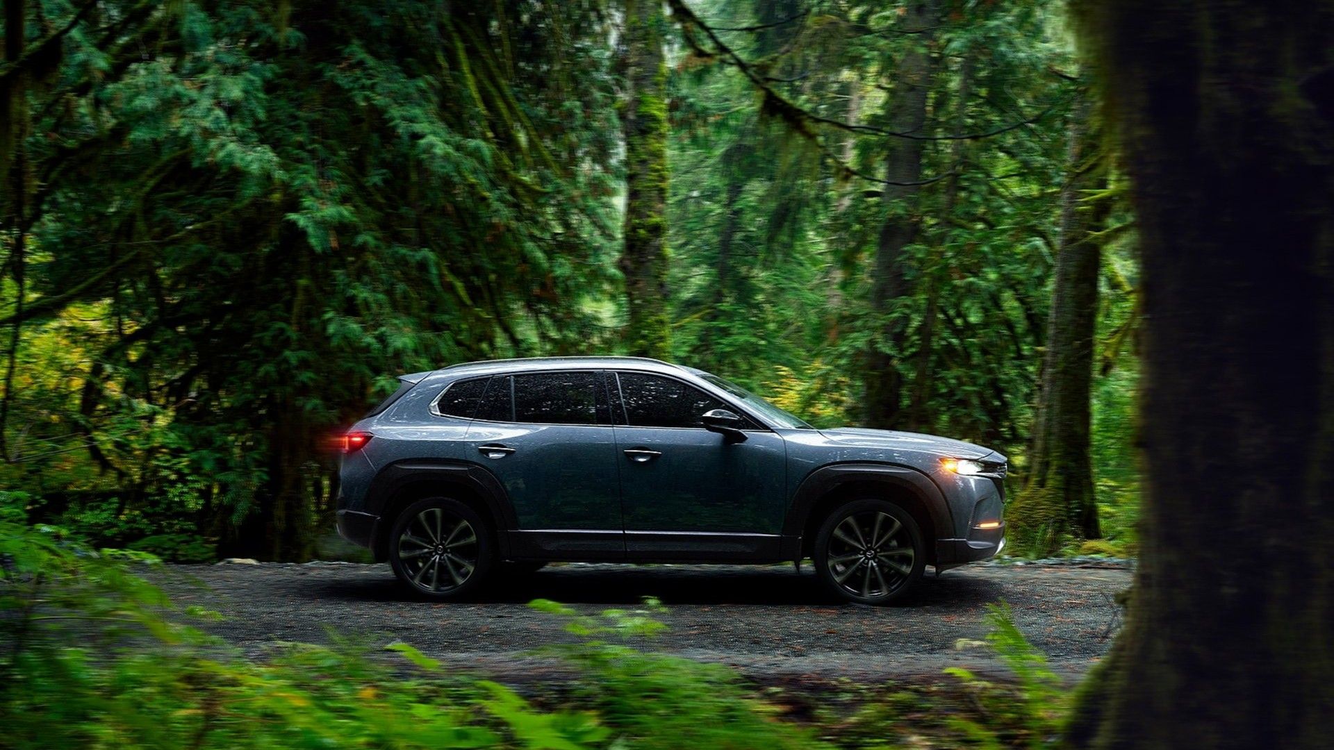 Side profile action shot of a 2023 Mazda CX-30.