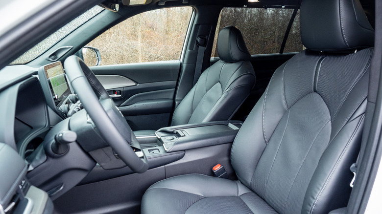 2026 Toyota Grand Highlander Hybrid Nightshade driver's side view of front passenger seats, dashboard and steering wheel