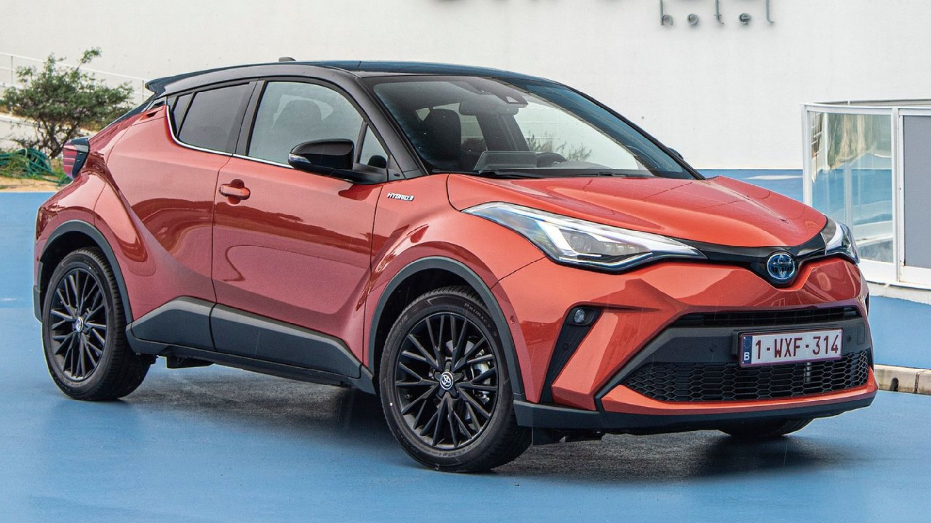 Static front 3/4 shot of an orange 2020 Toyota C-HR.