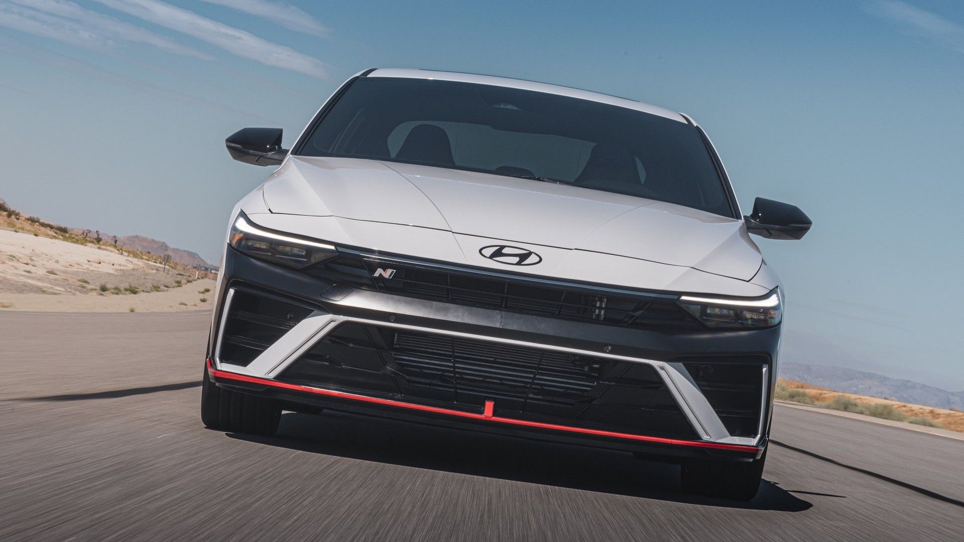 Head-on action shot of a 2024 Hyundai Elantra N 